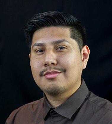 A headshot of Luis J.