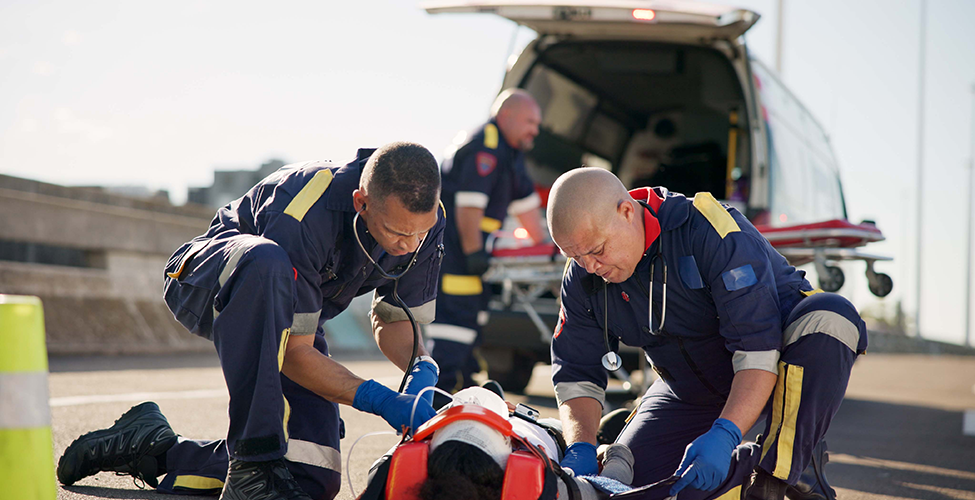 EMTs helping a patient