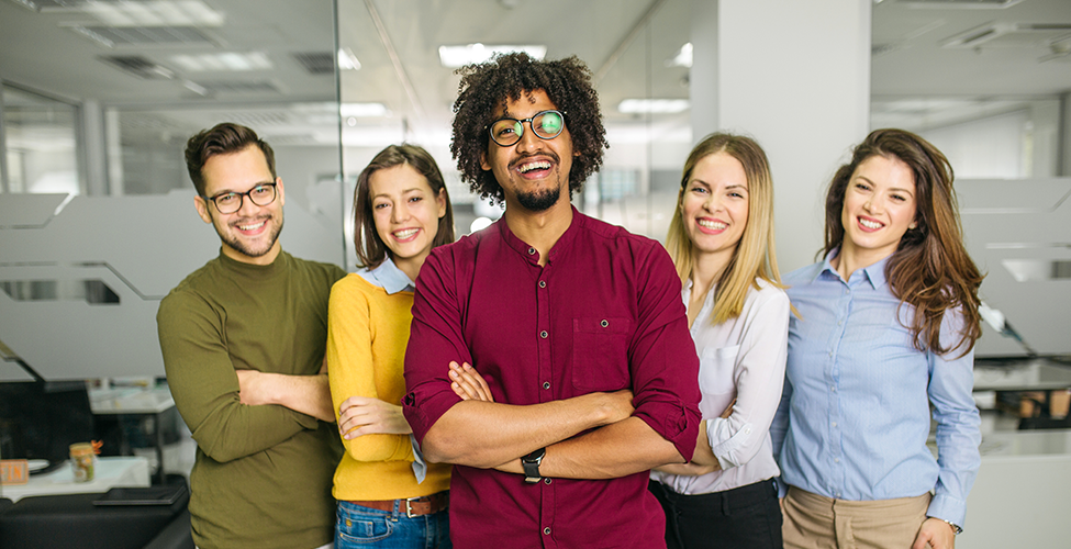 A group of students smiling at the camera.