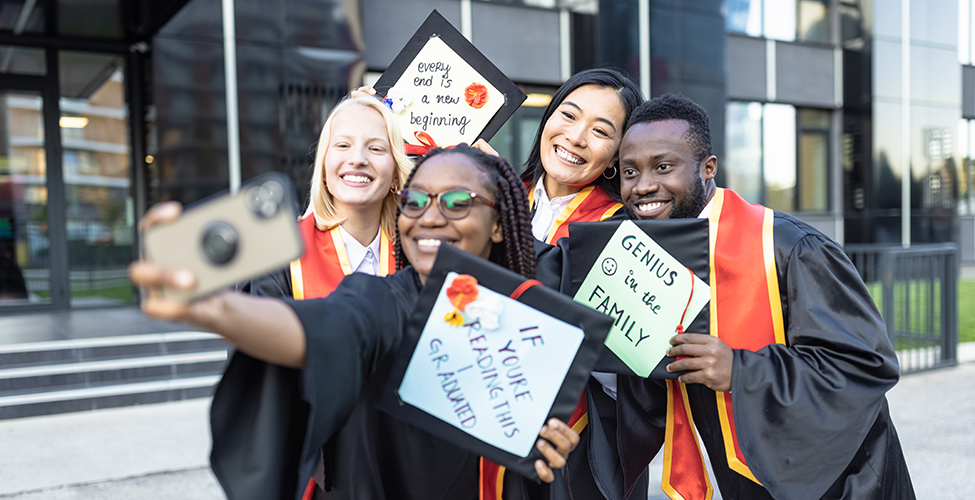 A group of smiling graduates
