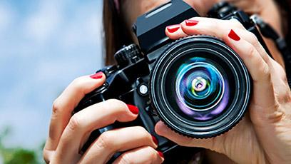 Student holding a camera.