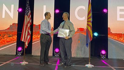 Chad Stroot, GCC Cyber Graduate, Martin Bencic, GCC Cybersecurity Program Director. Receiving the CAE designation for GCC.