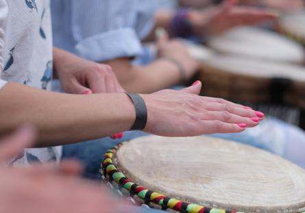 People playing hand drums