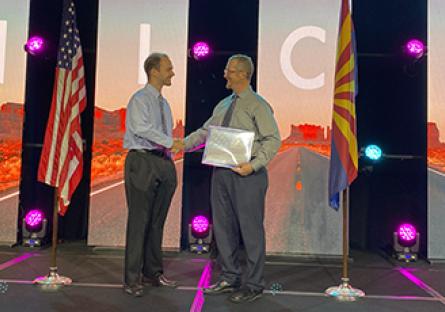 Chad Stroot, GCC Cyber Graduate, Martin Bencic, GCC Cybersecurity Program Director. Receiving the CAE designation for GCC.