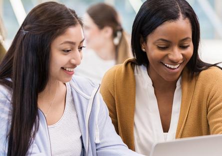 Female college students studying.