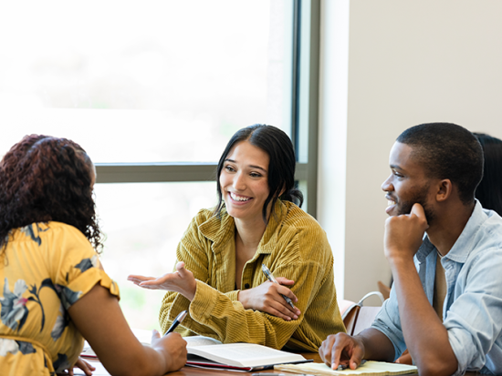 Group of students studying on campus.