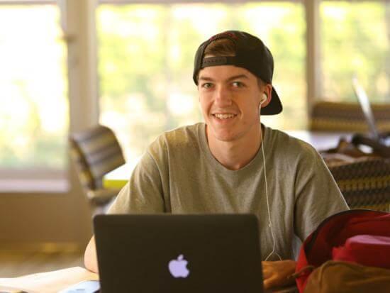 Student working on a laptop