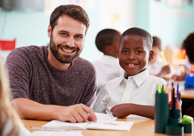 Therapist working with a young child.