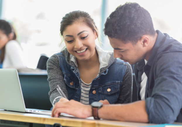 Two students studying on campus