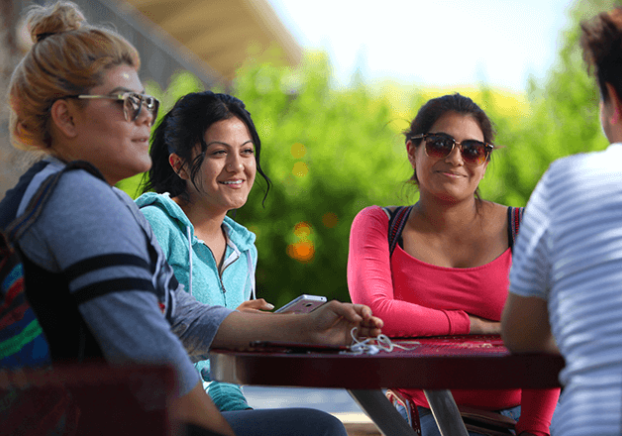 Image of GCC students are smiling and having conversation