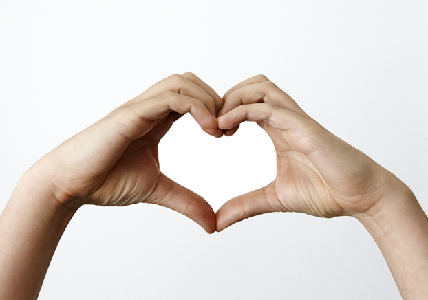 Hands making a heartshape.